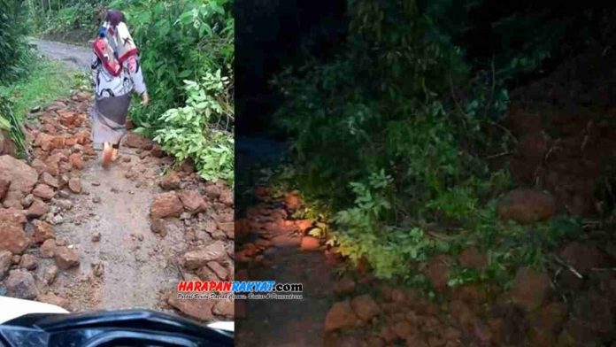 Akibat hujan deras yang terjadi Jum’at sore kemarin, tebing setingi 5 meter longsor. Material longsoran berupa tanah dan batu menutup jalan penghubung Langkaplancar, Pangandaran-Salopa, Tasikmalaya.