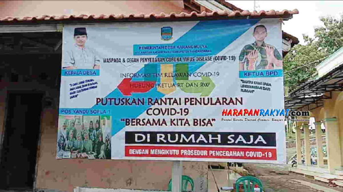 spanduk d kawasan waspada corona di pangandaran