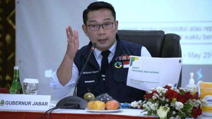 Gubernur Jabar, Ridwan Kamil, saat memimpin rapat Gugus Tugas Percepatan Penanggulangan Covid-19 Jabar, bertempat di Mapolda Jabar, Kota Bandung, Rabu (27/5/20). Foto: Humas Jabar.