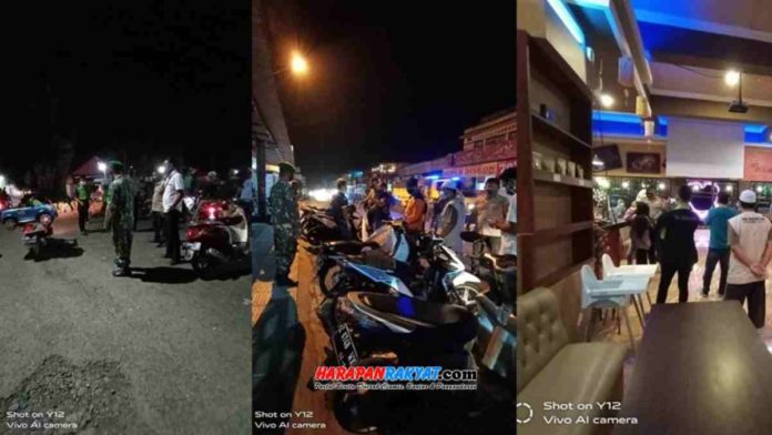 Menjelang berakhirnya pelaksanaan PPKM, Tim Satgas Kecamatan Banjarsari, Kabupaten Ciamis, Jawa Barat, membubarkan kerumunan di sejumlah tempat, pada Minggu (07/02/2021) malam. Foto: Suherman/HR.