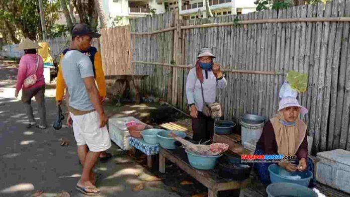 pedagang tradisional baskoman