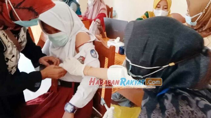 Vaksinasi Dosis Pertama