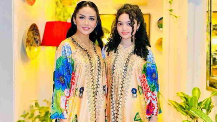 Krisdayanti dan Amora Lemos